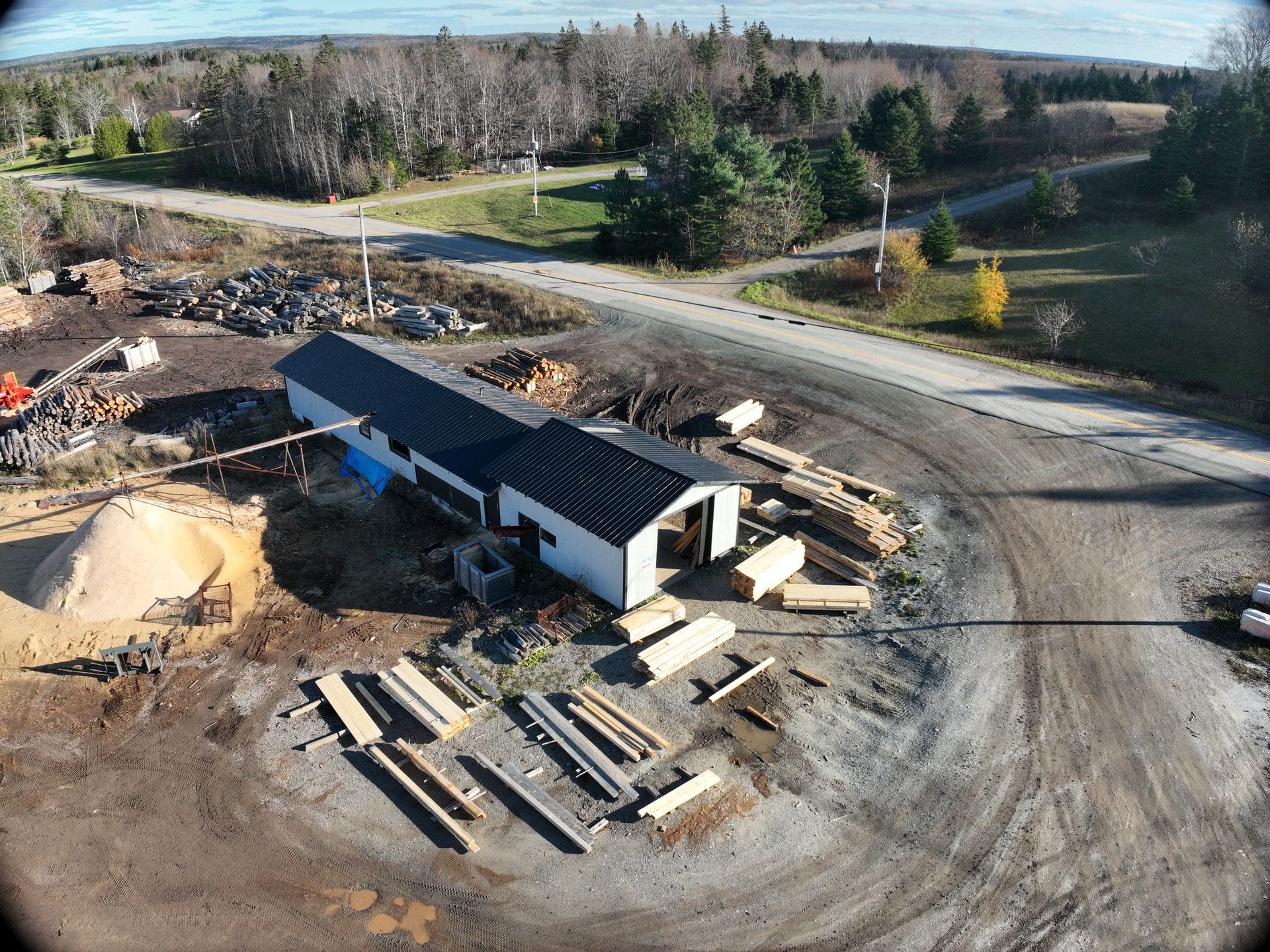 Aerial drone view of Hugh MacInnis Lumber sawmill site in Cape Breton
